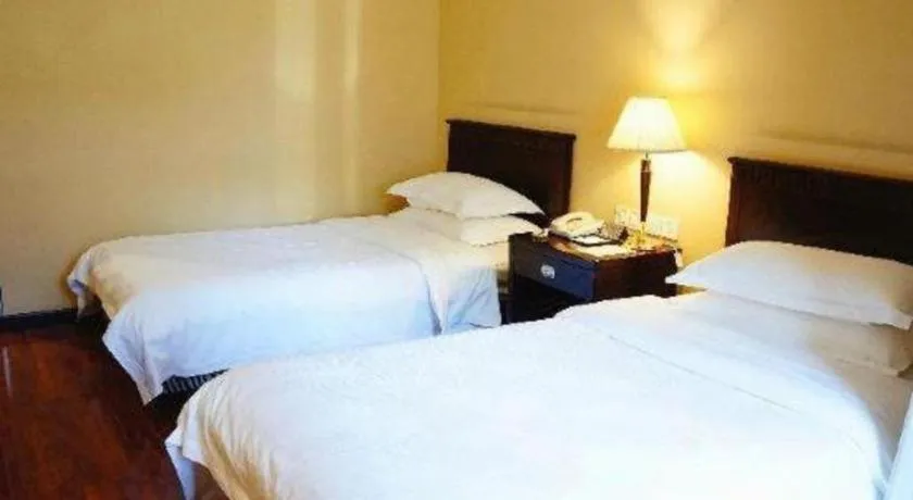 Bed in Hujialou Hot Spring Hotel