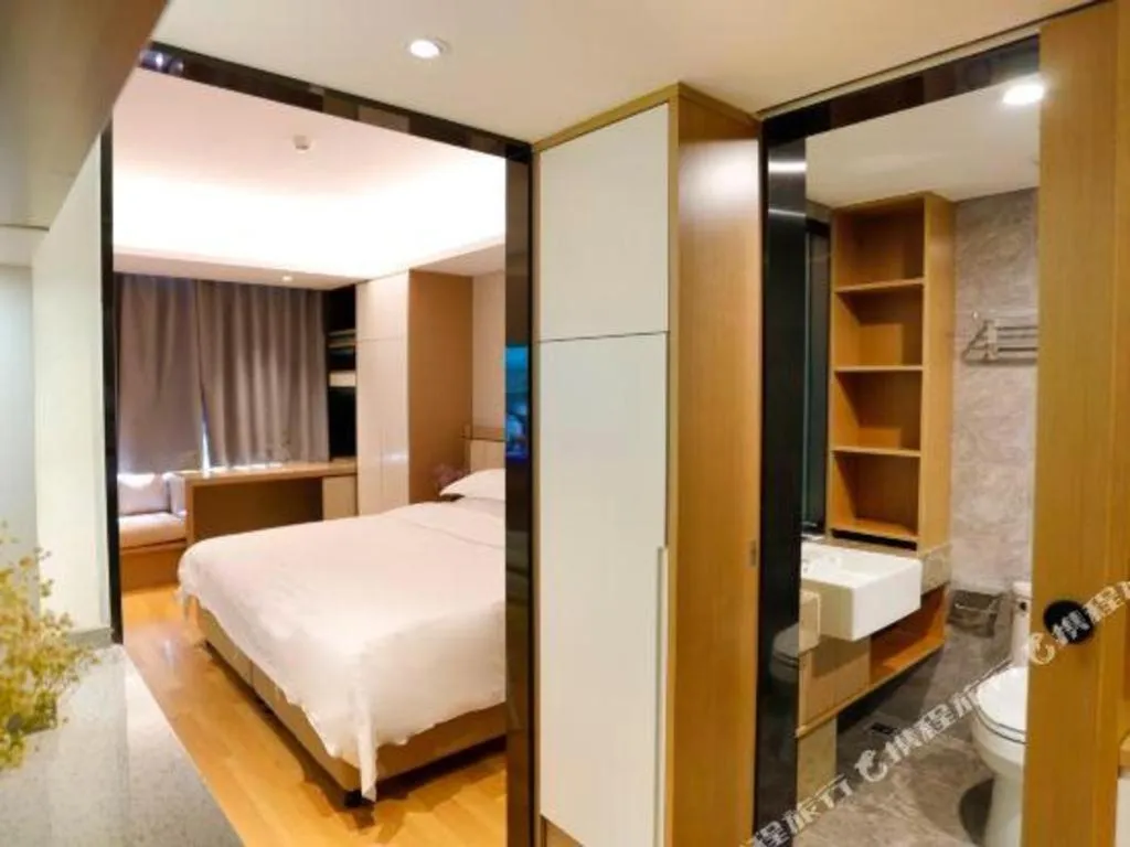 Bed in Hujialou Hot Spring Hotel