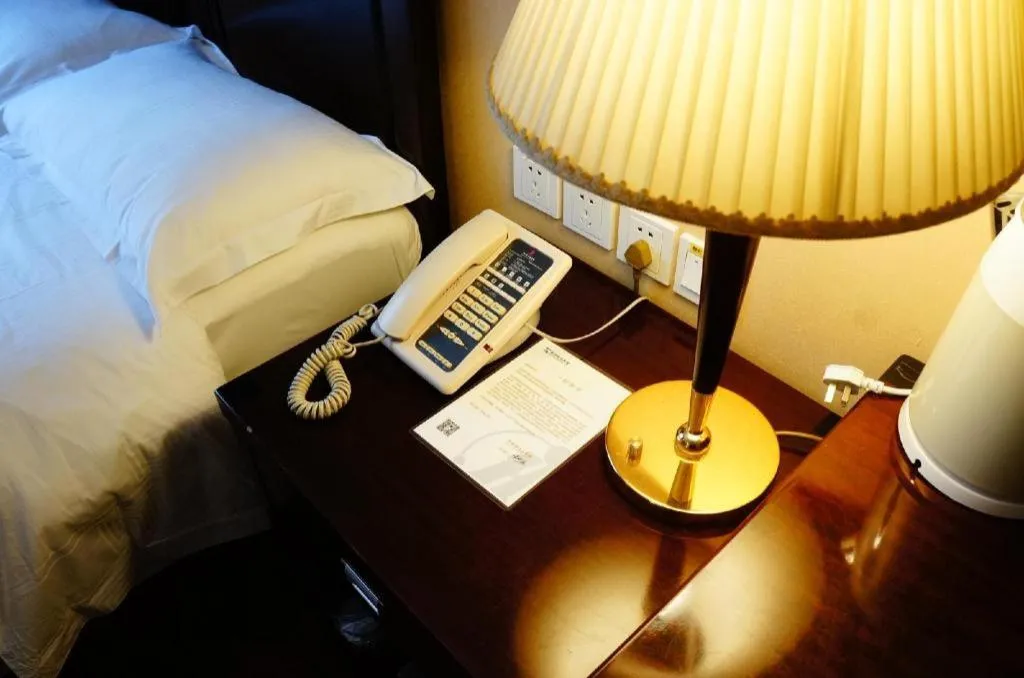 Bed in Hujialou Hot Spring Hotel