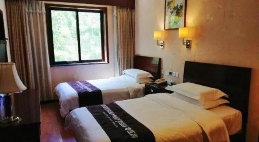 Bed in Hujialou Hot Spring Hotel