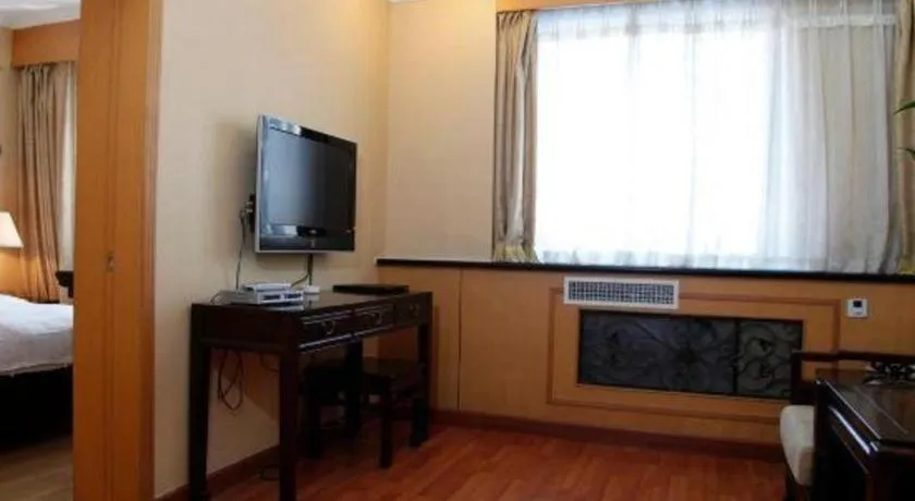 Bed in Hujialou Hot Spring Hotel