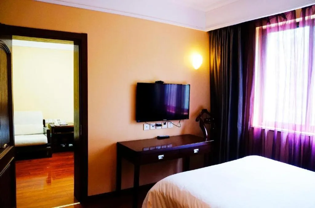 Bed in Hujialou Hot Spring Hotel