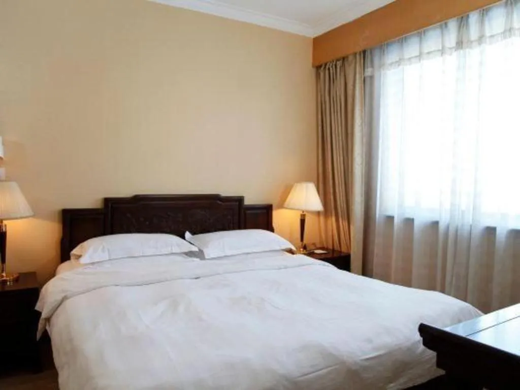 Bed in Hujialou Hot Spring Hotel