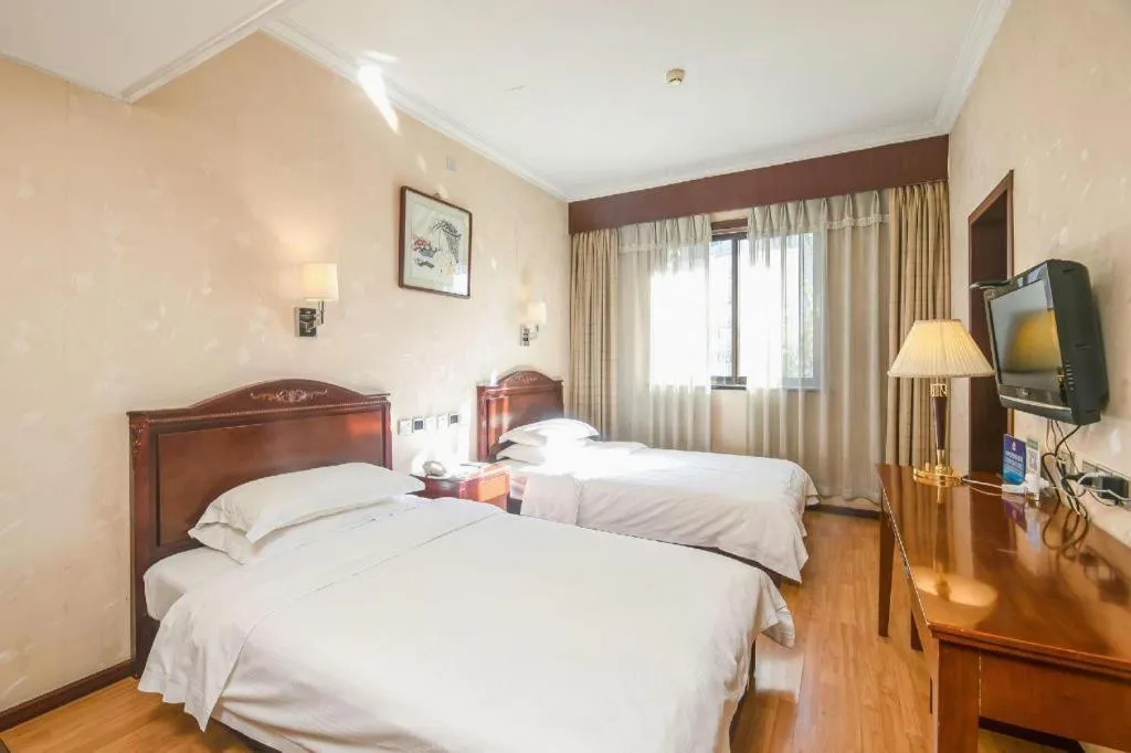 Bed in Hujialou Hot Spring Hotel