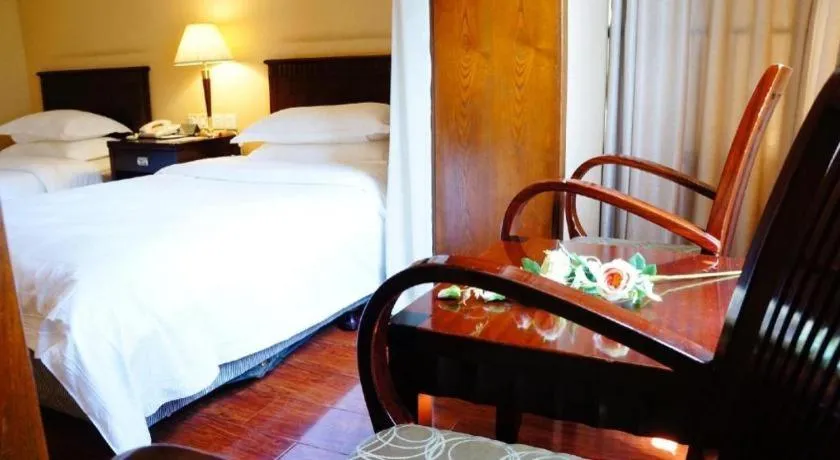 Bed in Hujialou Hot Spring Hotel