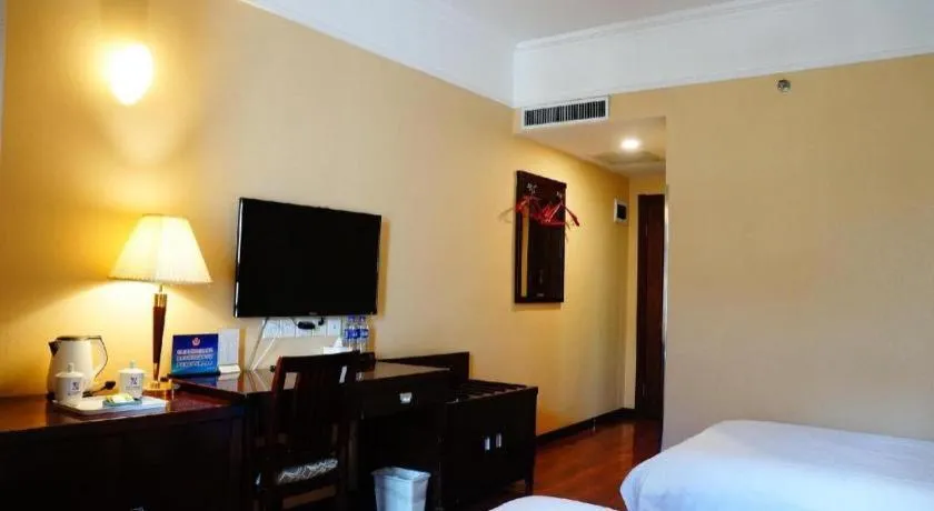 Bed in Hujialou Hot Spring Hotel