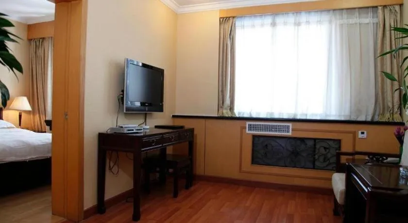 Bed in Hujialou Hot Spring Hotel