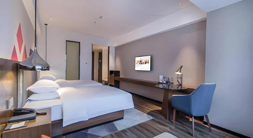 Bed in Borrman Hotel Nanning Railway Station