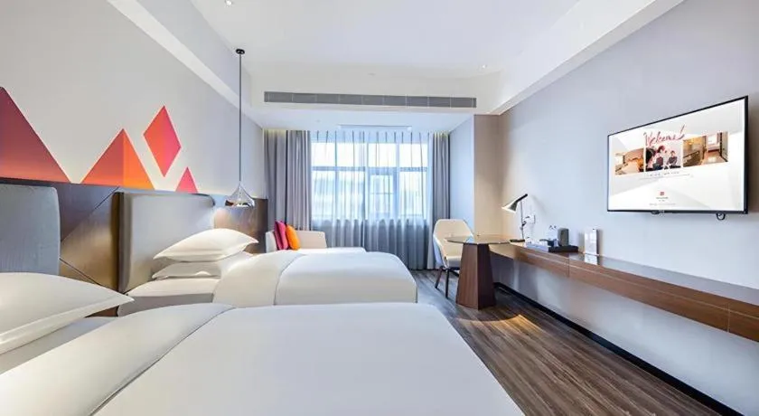 Bed in Borrman Hotel Nanning Railway Station