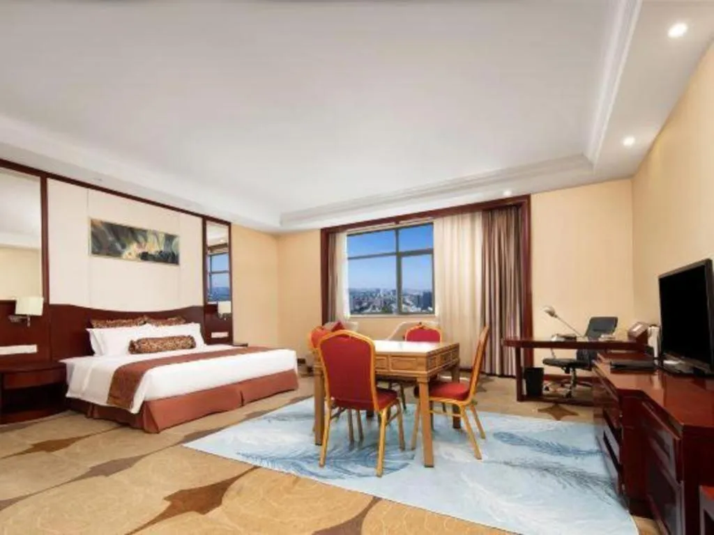 Bed in Longqi Jianguo Hotel Kunshan