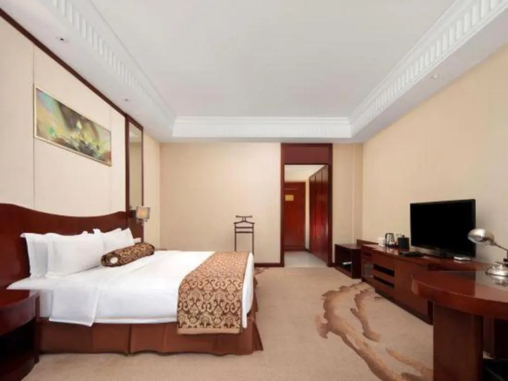 Bed in Longqi Jianguo Hotel Kunshan