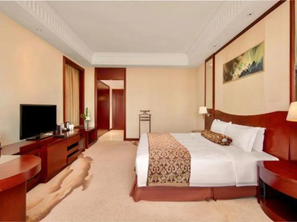 Bed in Longqi Jianguo Hotel Kunshan