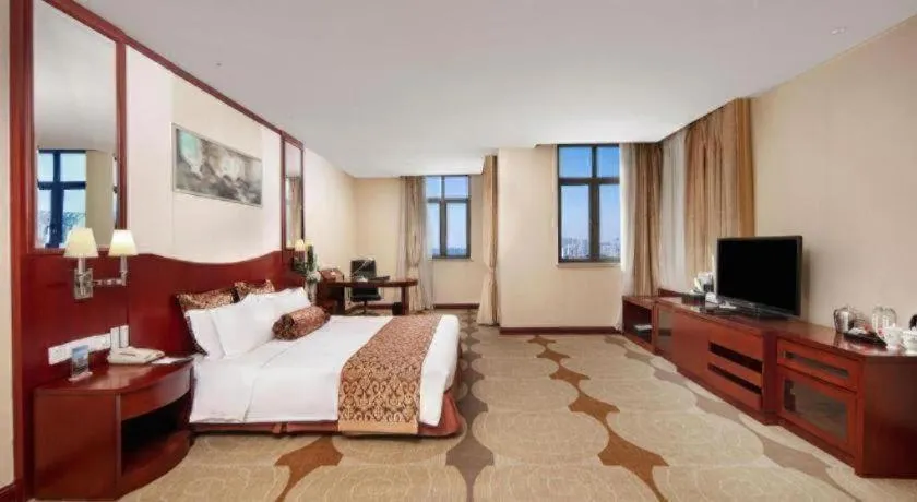 Bed in Longqi Jianguo Hotel Kunshan