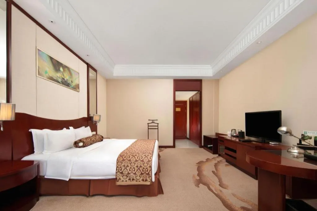 Bed in Longqi Jianguo Hotel Kunshan