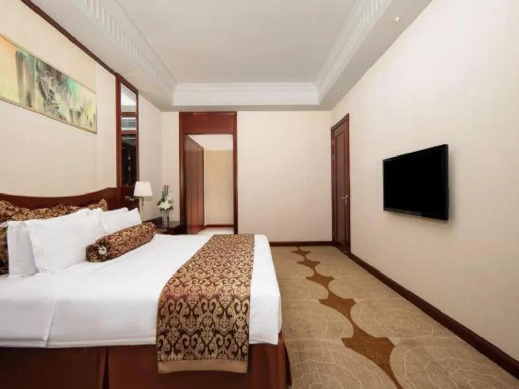 Bed in Longqi Jianguo Hotel Kunshan