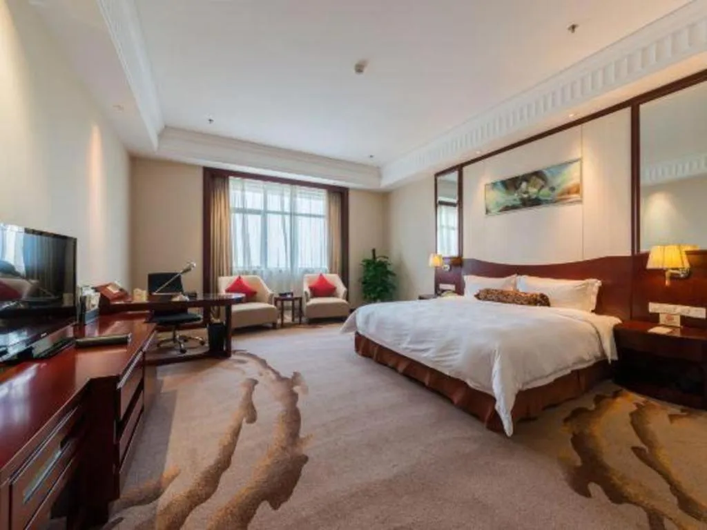 Bed in Longqi Jianguo Hotel Kunshan