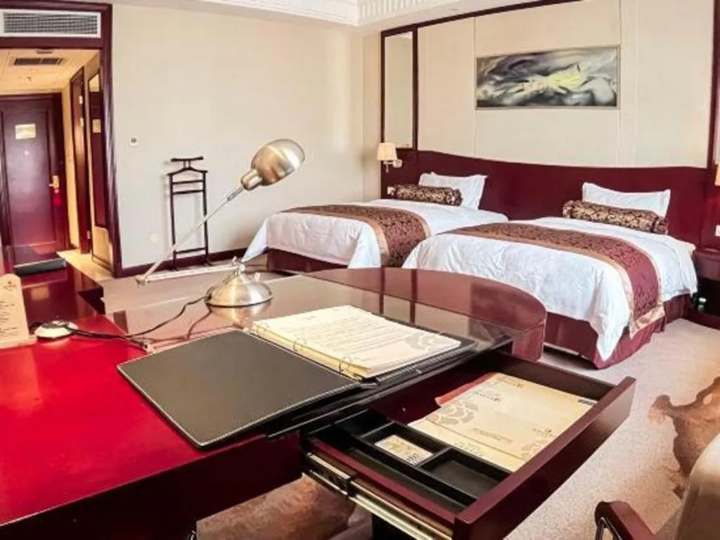 Bed in Longqi Jianguo Hotel Kunshan