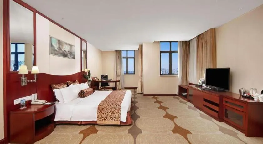 Bed in Longqi Jianguo Hotel Kunshan