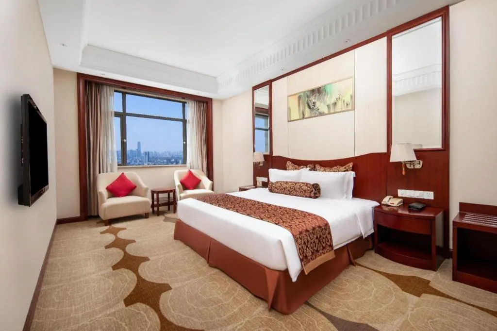 Bed in Longqi Jianguo Hotel Kunshan