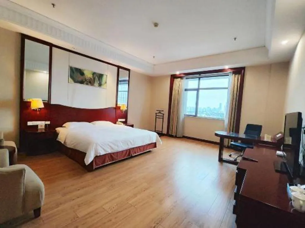 Bed in Longqi Jianguo Hotel Kunshan