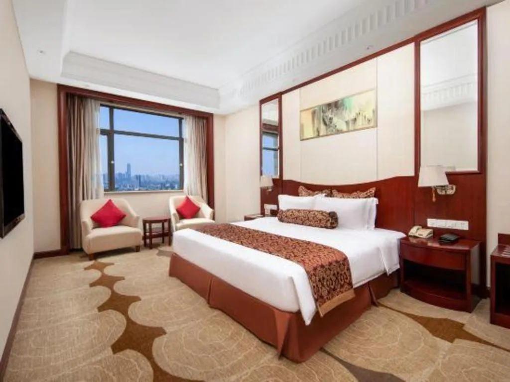 Bed in Longqi Jianguo Hotel Kunshan