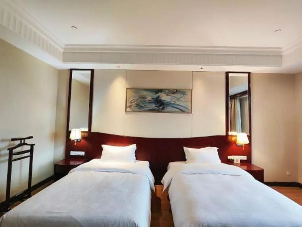 Bed in Longqi Jianguo Hotel Kunshan