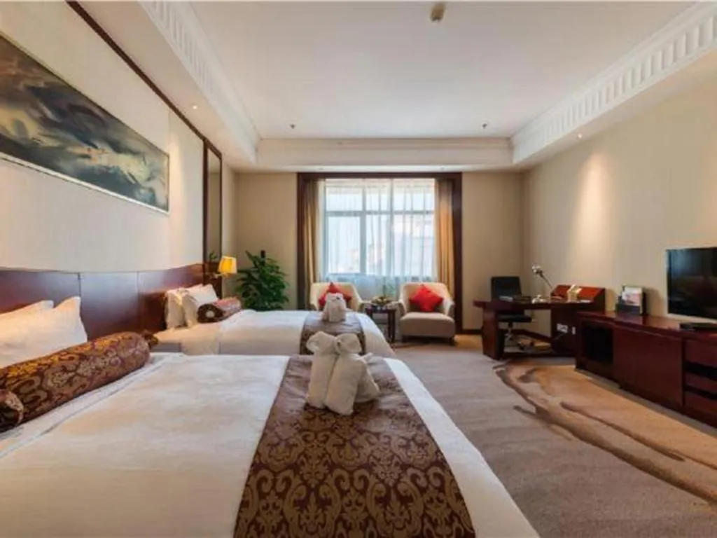 Bed in Longqi Jianguo Hotel Kunshan