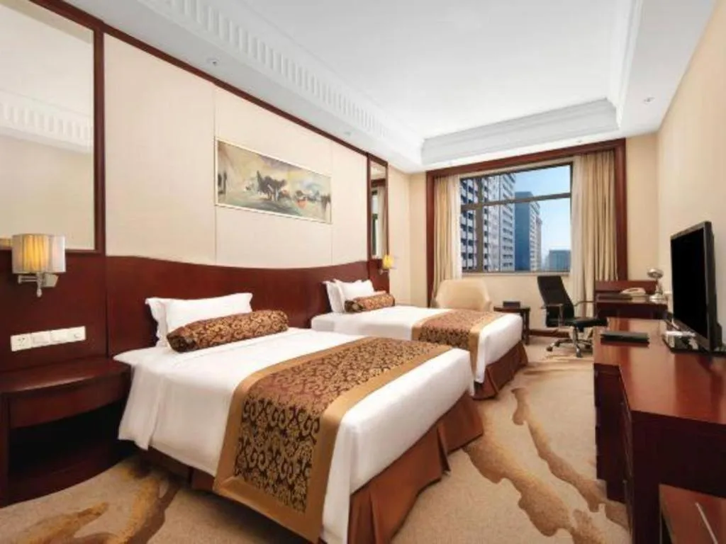 Bed in Longqi Jianguo Hotel Kunshan