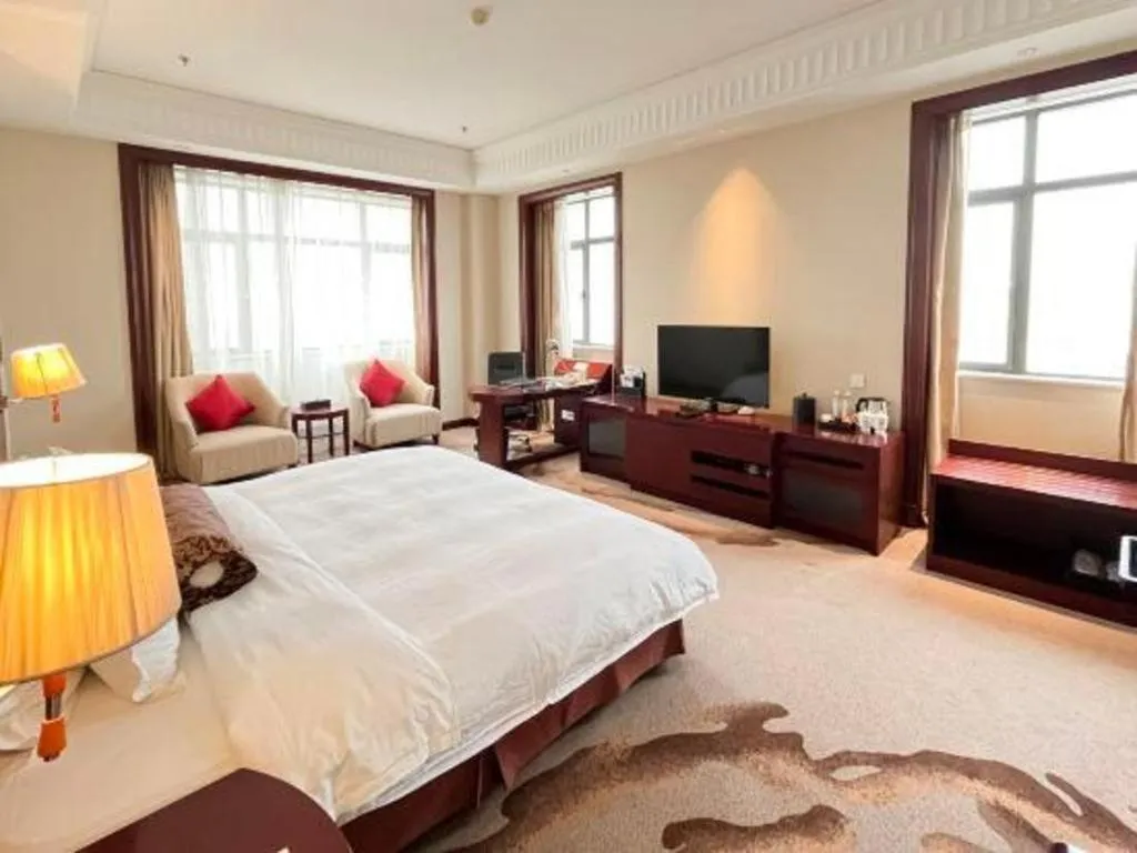 Bed in Longqi Jianguo Hotel Kunshan