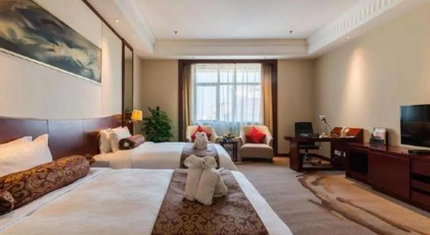 Bed in Longqi Jianguo Hotel Kunshan