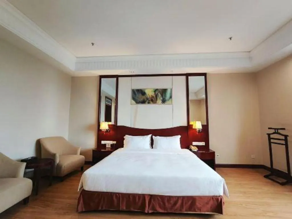 Bed in Longqi Jianguo Hotel Kunshan