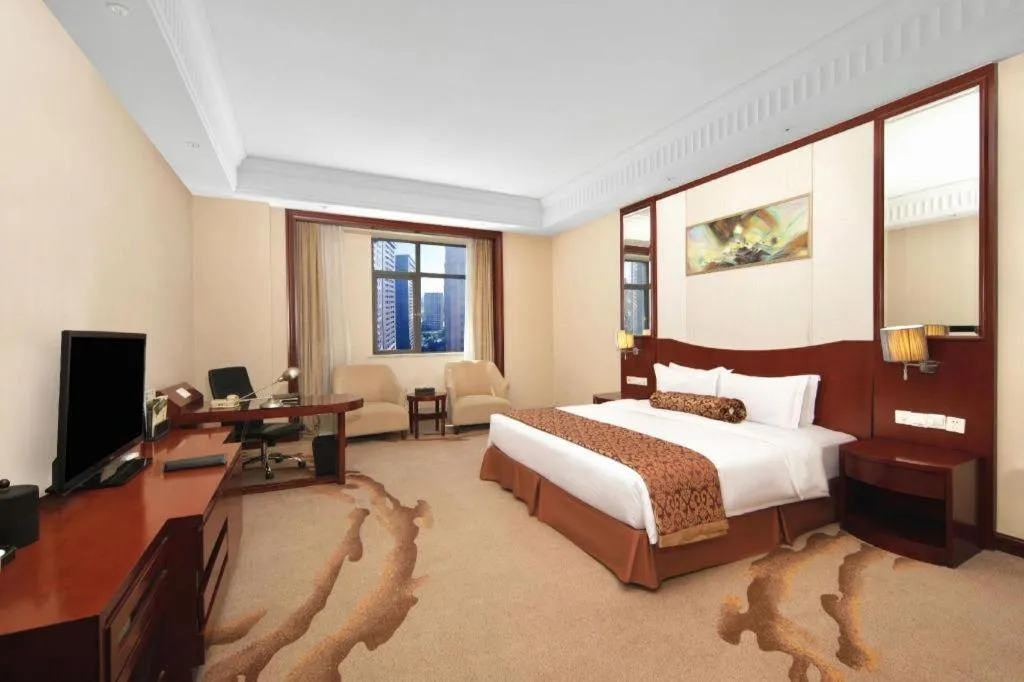 Bed in Longqi Jianguo Hotel Kunshan