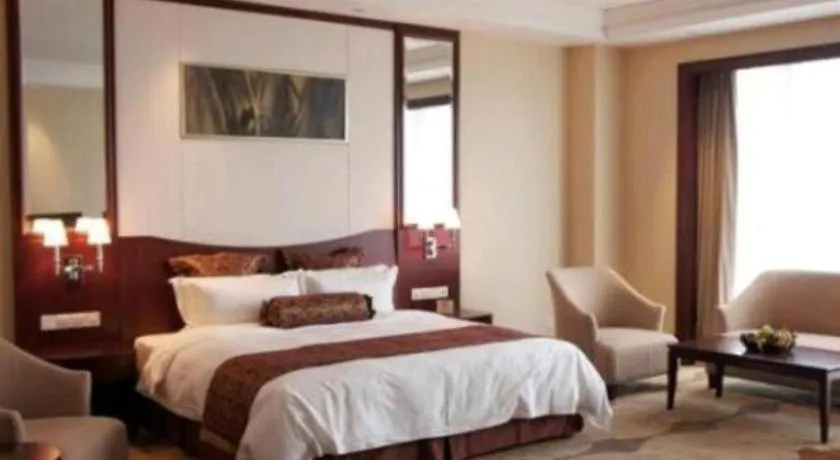 Bed in Longqi Jianguo Hotel Kunshan