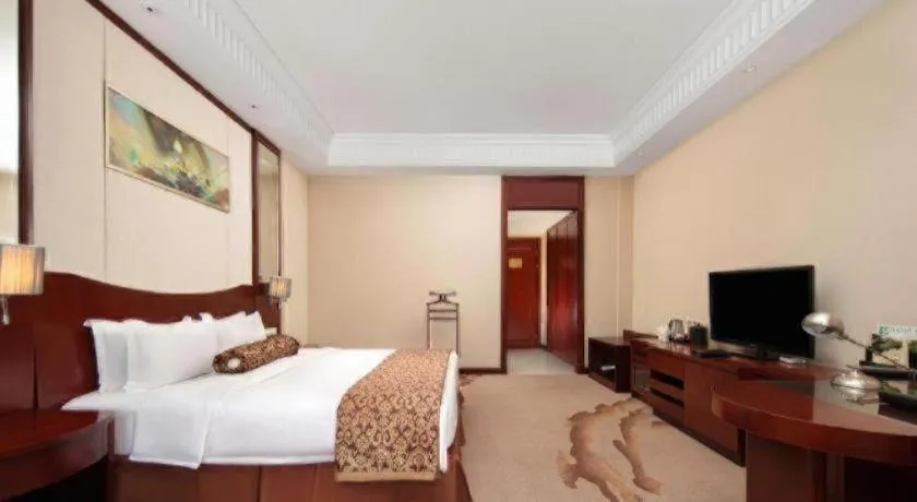 Bed in Longqi Jianguo Hotel Kunshan