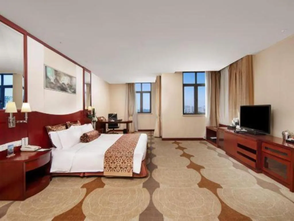 Bed in Longqi Jianguo Hotel Kunshan