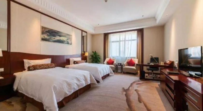 Bed in Longqi Jianguo Hotel Kunshan