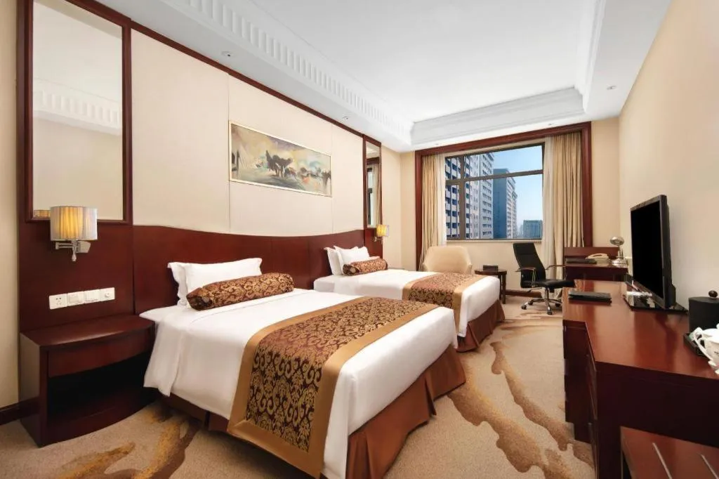 Bed in Longqi Jianguo Hotel Kunshan