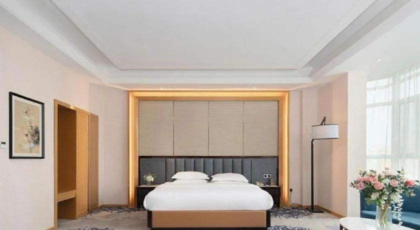 Bed in Metropolo Hotel Yining Development Zone Hanma Building