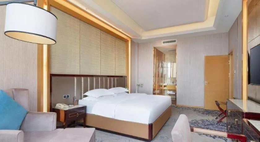 Bed in Metropolo Hotel Yining Development Zone Hanma Building
