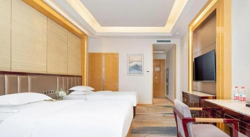 Bed in Metropolo Hotel Yining Development Zone Hanma Building