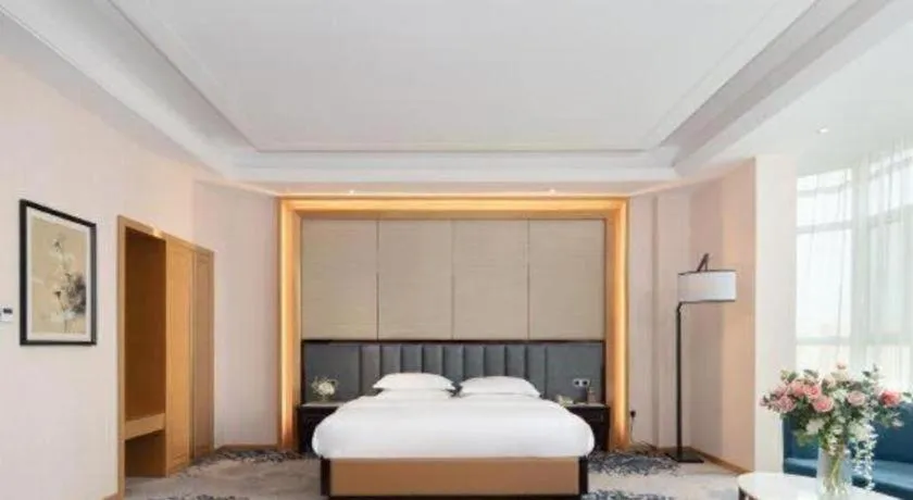 Bed in Metropolo Hotel Yining Development Zone Hanma Building