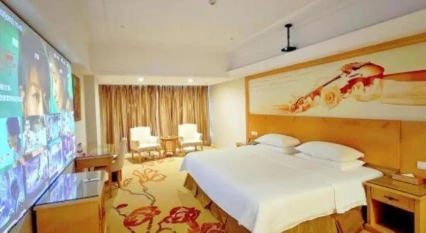Bed in Vienna Hotel Shenzhen Longgang Baifucheng