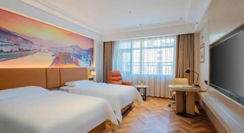 Bed in Vienna Hotel Shenzhen Longgang Baifucheng