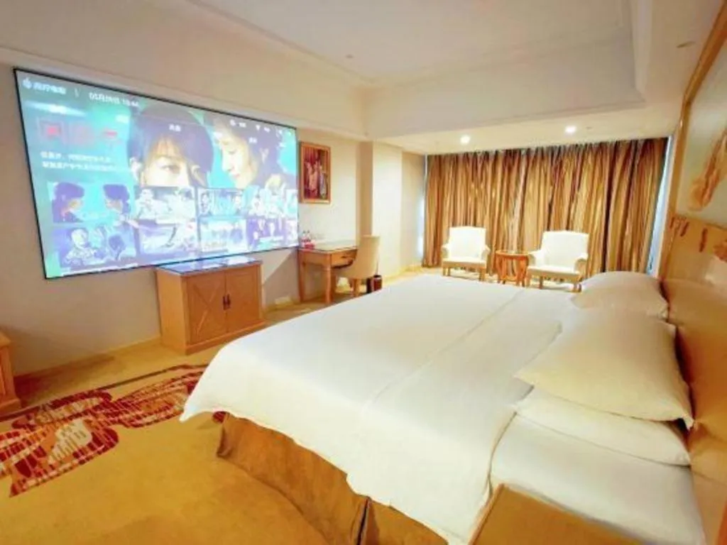 Bed in Vienna Hotel Shenzhen Longgang Baifucheng