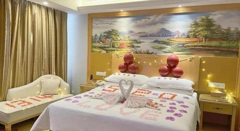 Bed in Vienna Hotel Shenzhen Longgang Baifucheng