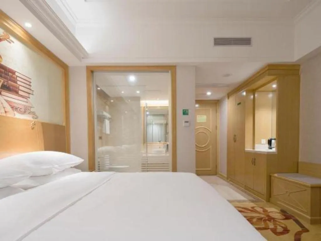 Bed in Vienna Hotel Shenzhen Longgang Baifucheng