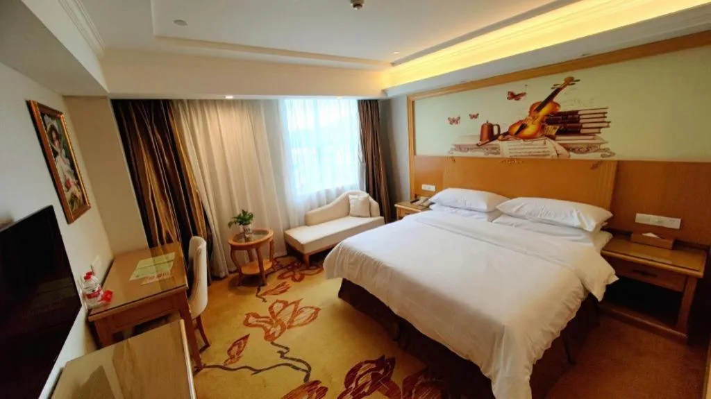 Bed in Vienna Hotel Shenzhen Longgang Baifucheng