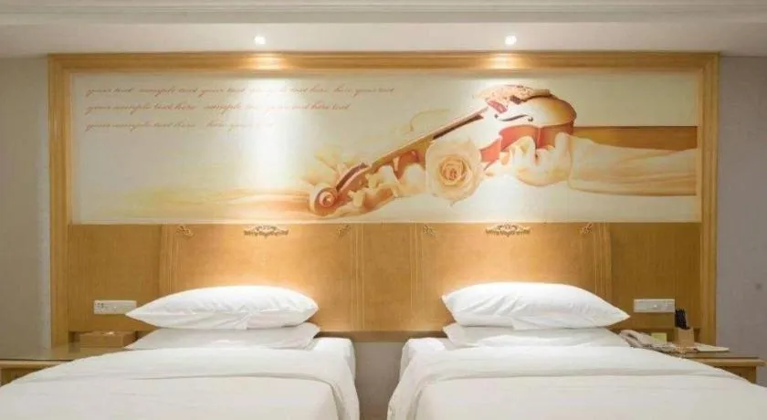 Bed in Vienna Hotel Shenzhen Longgang Baifucheng