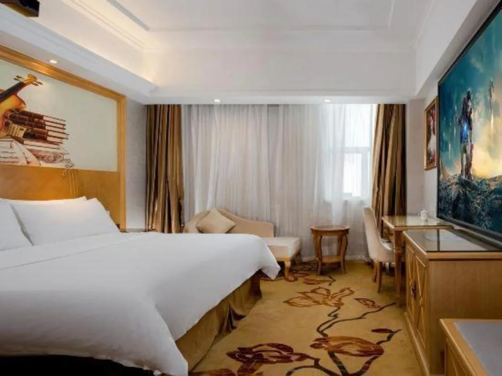 Bed in Vienna Hotel Shenzhen Longgang Baifucheng