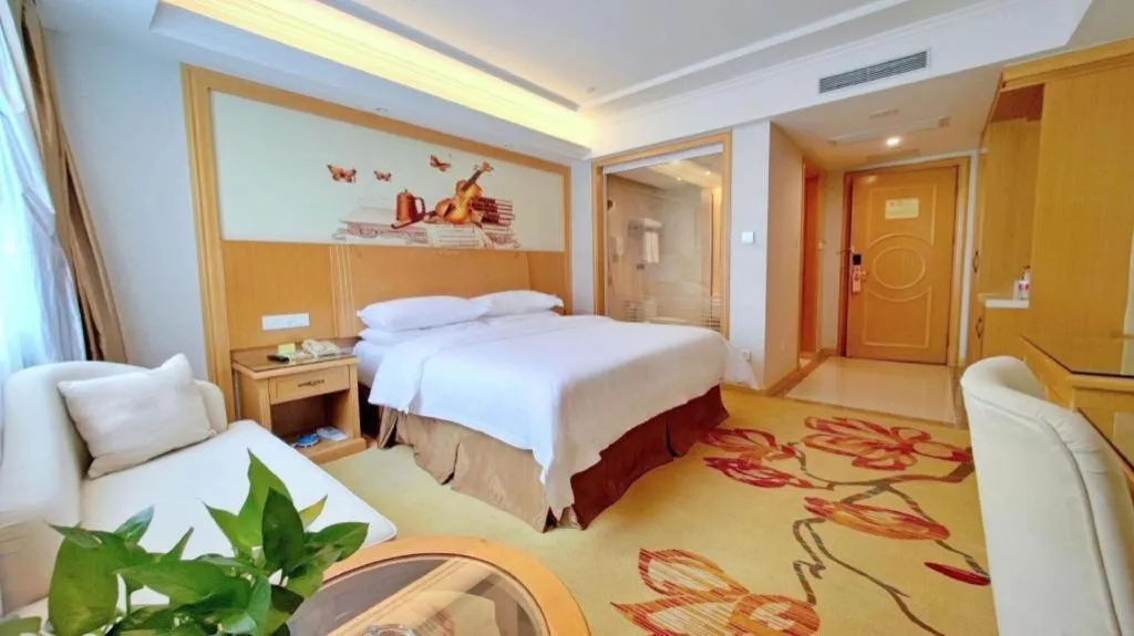 Bed in Vienna Hotel Shenzhen Longgang Baifucheng
